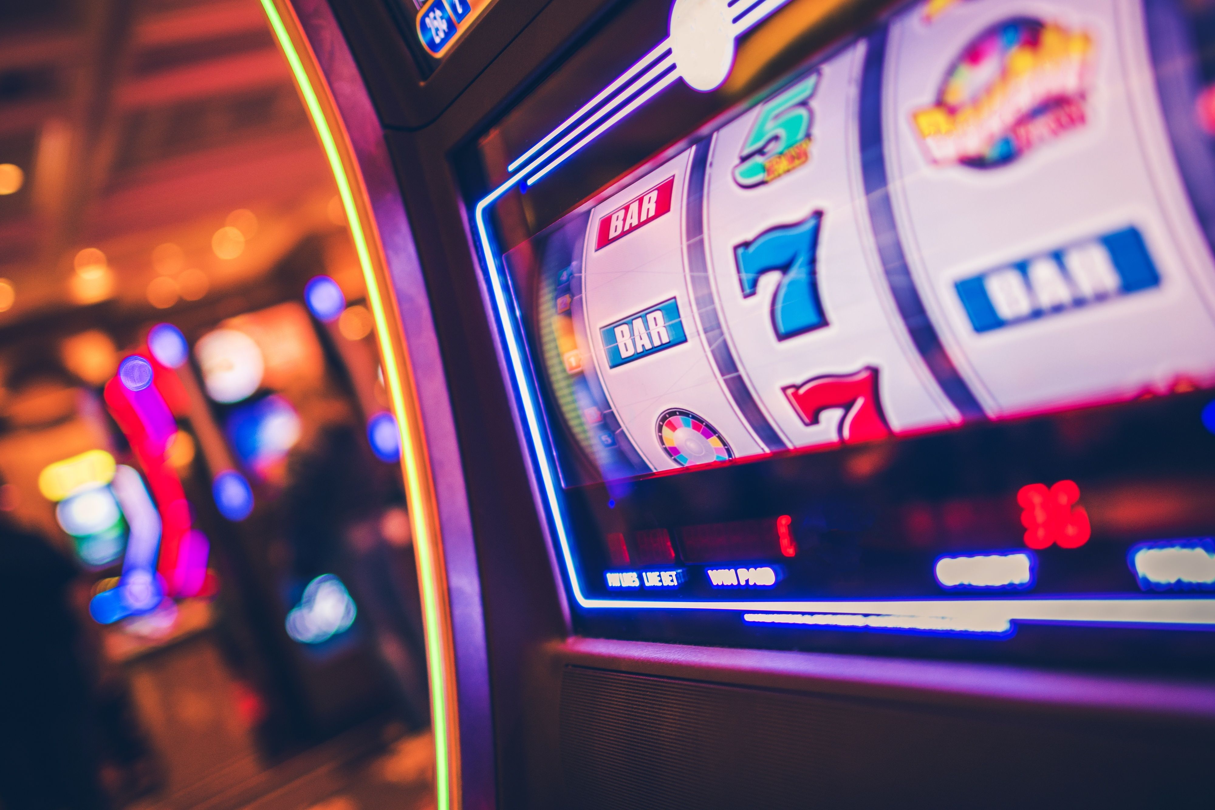 Mobile phone displaying lorenzo slot Monopoly Live bet interface with property zones and multiplier values
